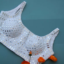 Back view of white mirror work blouse with back closure