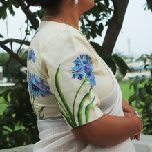 V neckline detail of beige hand-painted tussar silk blouse