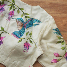 Side view of beige hummingbird hand-painted tussar silk blouse