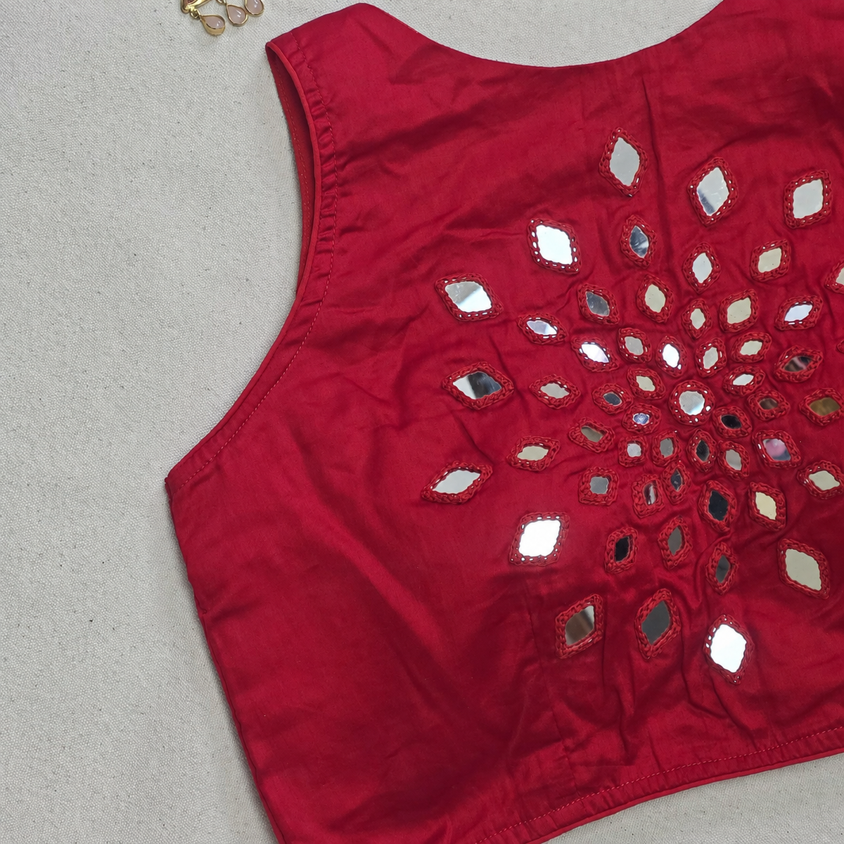 Sleeveless red mirror work saree blouse in cotton silk